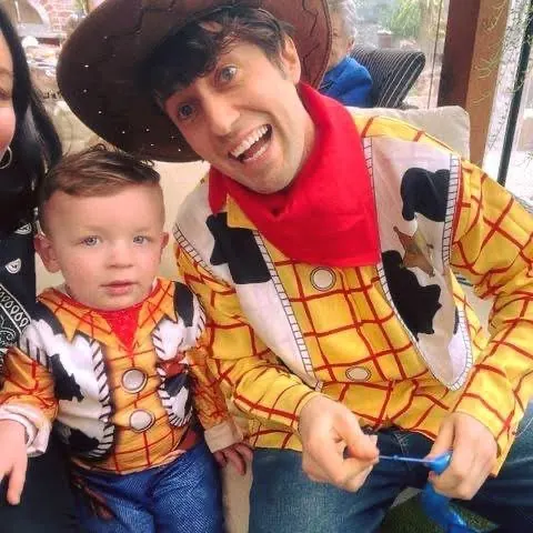 Toy Story Woody character entertainer with toddler boy in matching cowboy costume at a Melbourne kids birthday party